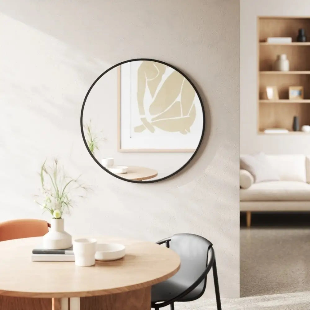 Väggspegel UMBRA - HUB 94 cm, svart – produktbild av Speglar från Umbra | Arvande